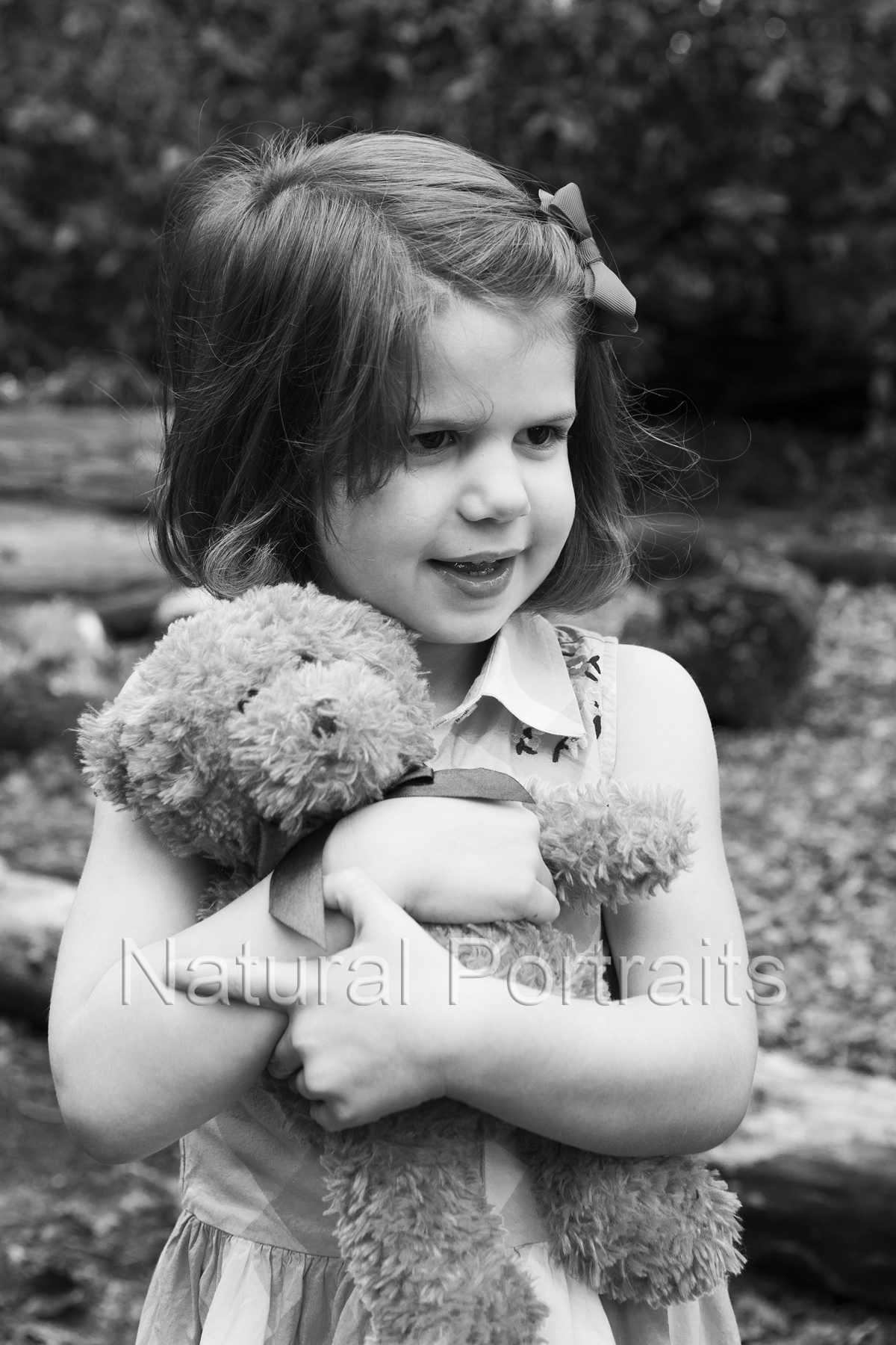 photo of girl with teddy