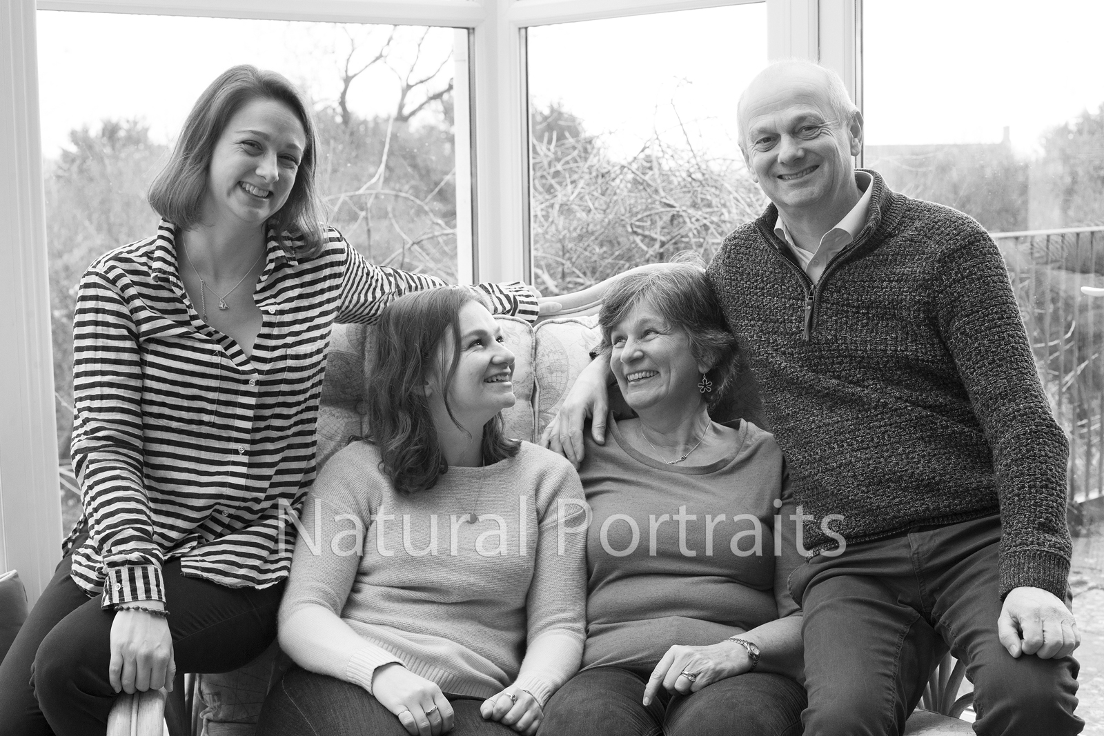 family sitting at home somerset