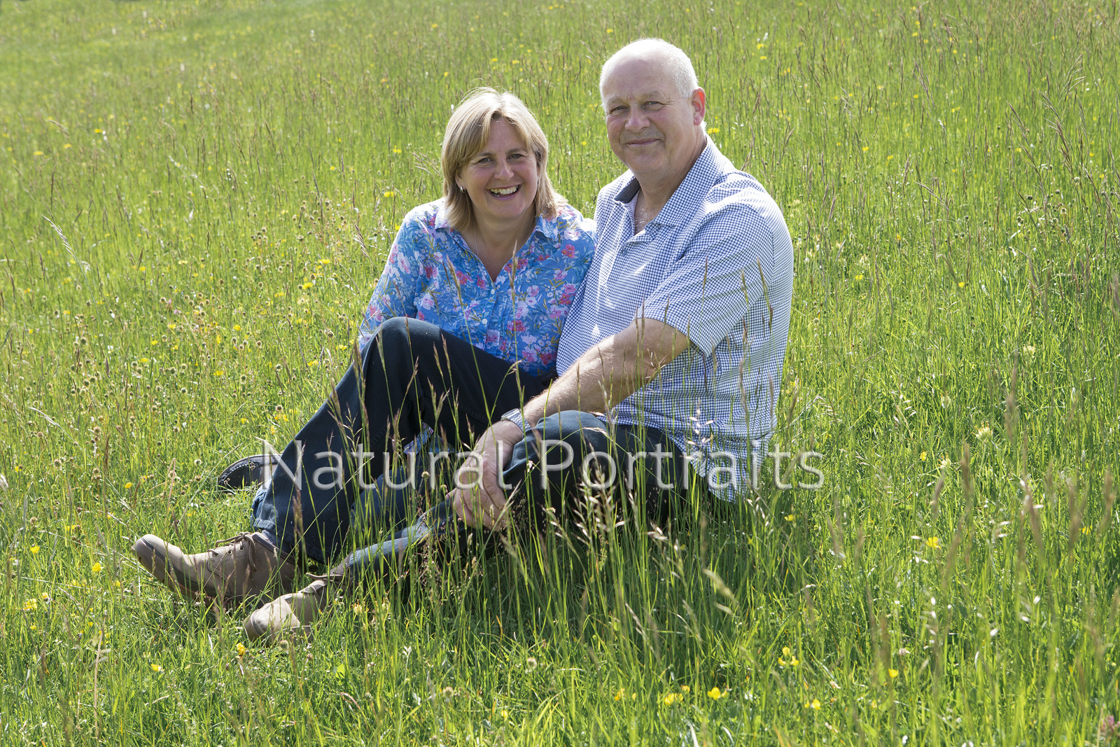 Photo of couple in meadow