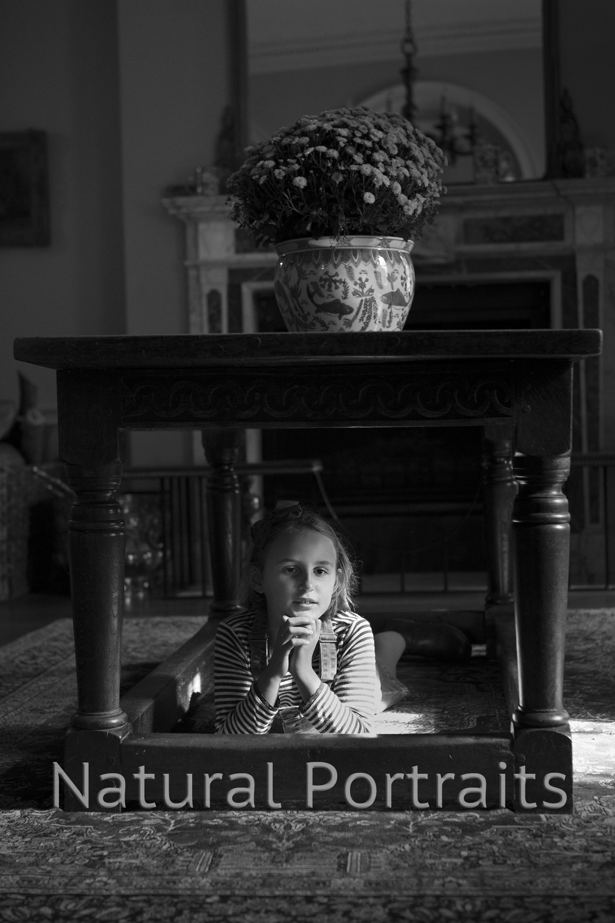 girl under table photo somerset